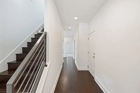 a view of a hallway with entryway