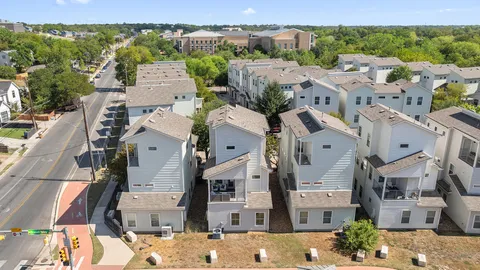 an aerial view of multiple house