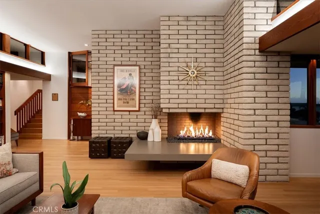a kitchen with stainless steel appliances granite countertop a sink and a refrigerator