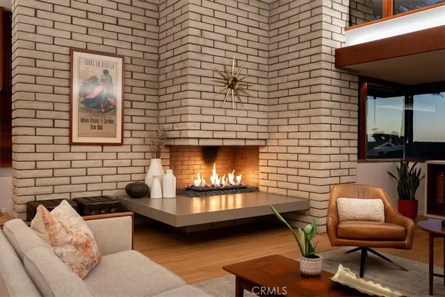 a kitchen with stainless steel appliances granite countertop a sink and a refrigerator