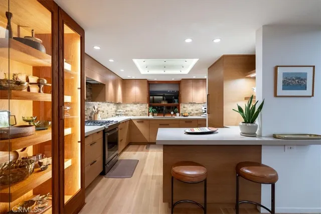 a room with furniture and a large window