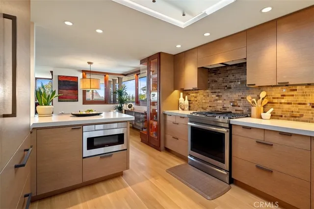 a bathroom with a shower sink and mirror