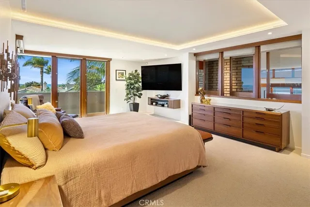 a bathroom with a double vanity sink toilet and shower