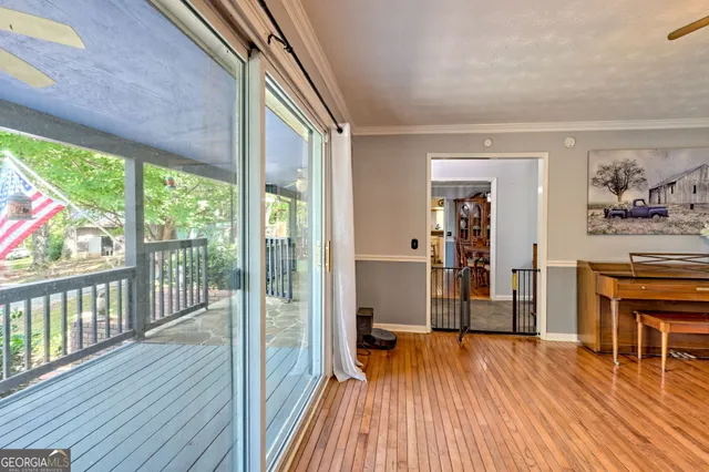 a kitchen with granite countertop white cabinets and sink