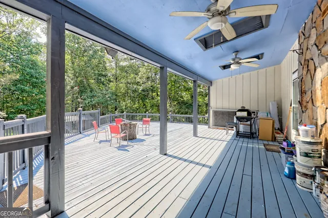 a view of a swimming pool with a yard