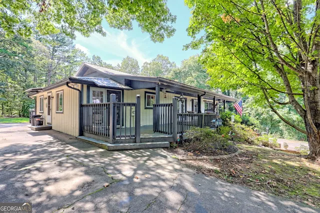 a view of a living room and a wooden floor