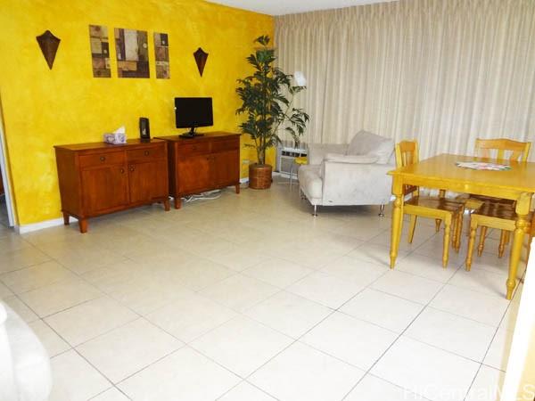 2572 Lemon Road, Unit 306 Honolulu, HI 96815 - Photo 1 of 13 a living room with furniture and a table