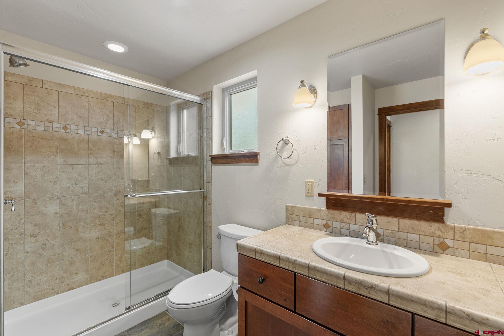 212 Copper Rim Trail, Unit B Durango, CO 81301 - Photo 19 of 44 Main living level bathroom.