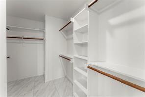 238 Rudder Road Gun Barrel City, TX 75156 - Photo 19 of 27 a view of walk in closet with empty racks