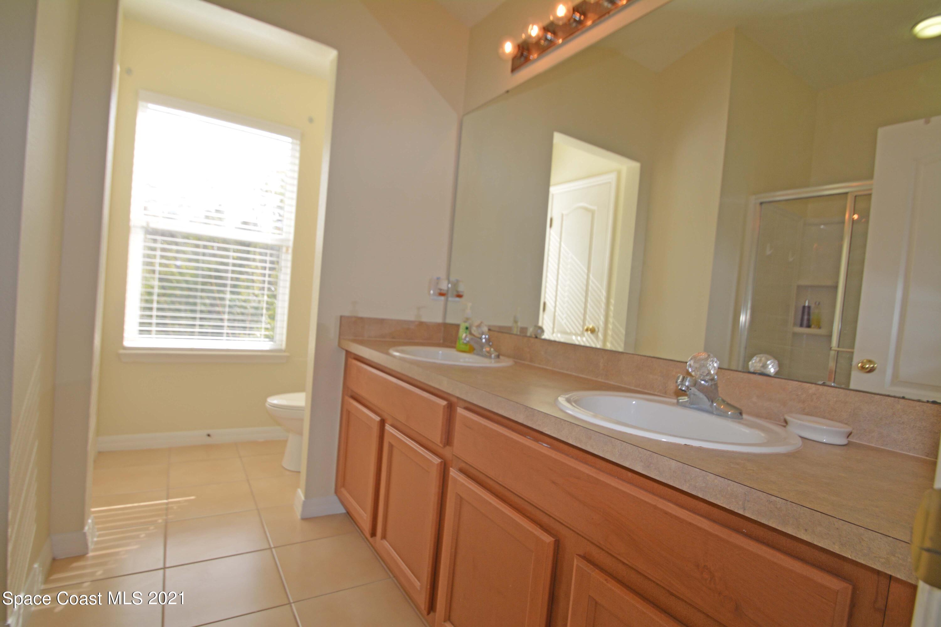 6680 South Goldenrod Road, Unit B' Orlando, FL 32822 - Photo 17 of 19 Primary Ensuite