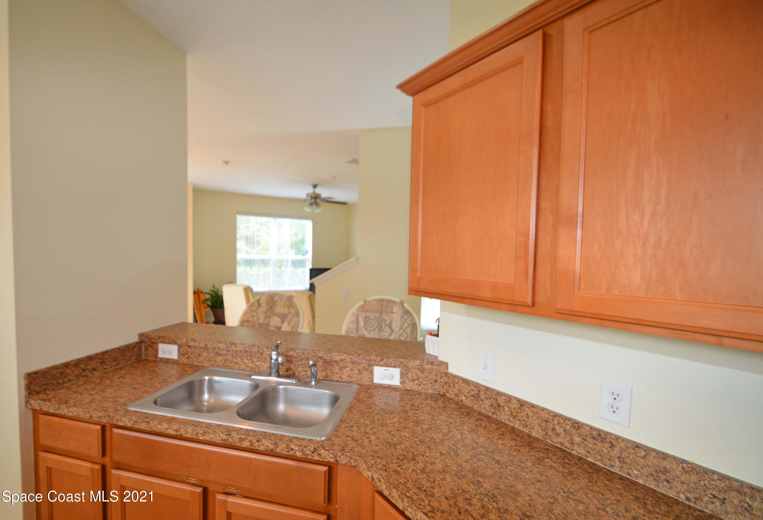 6680 South Goldenrod Road, Unit B' Orlando, FL 32822 - Photo 7 of 19 Kitchen to LR