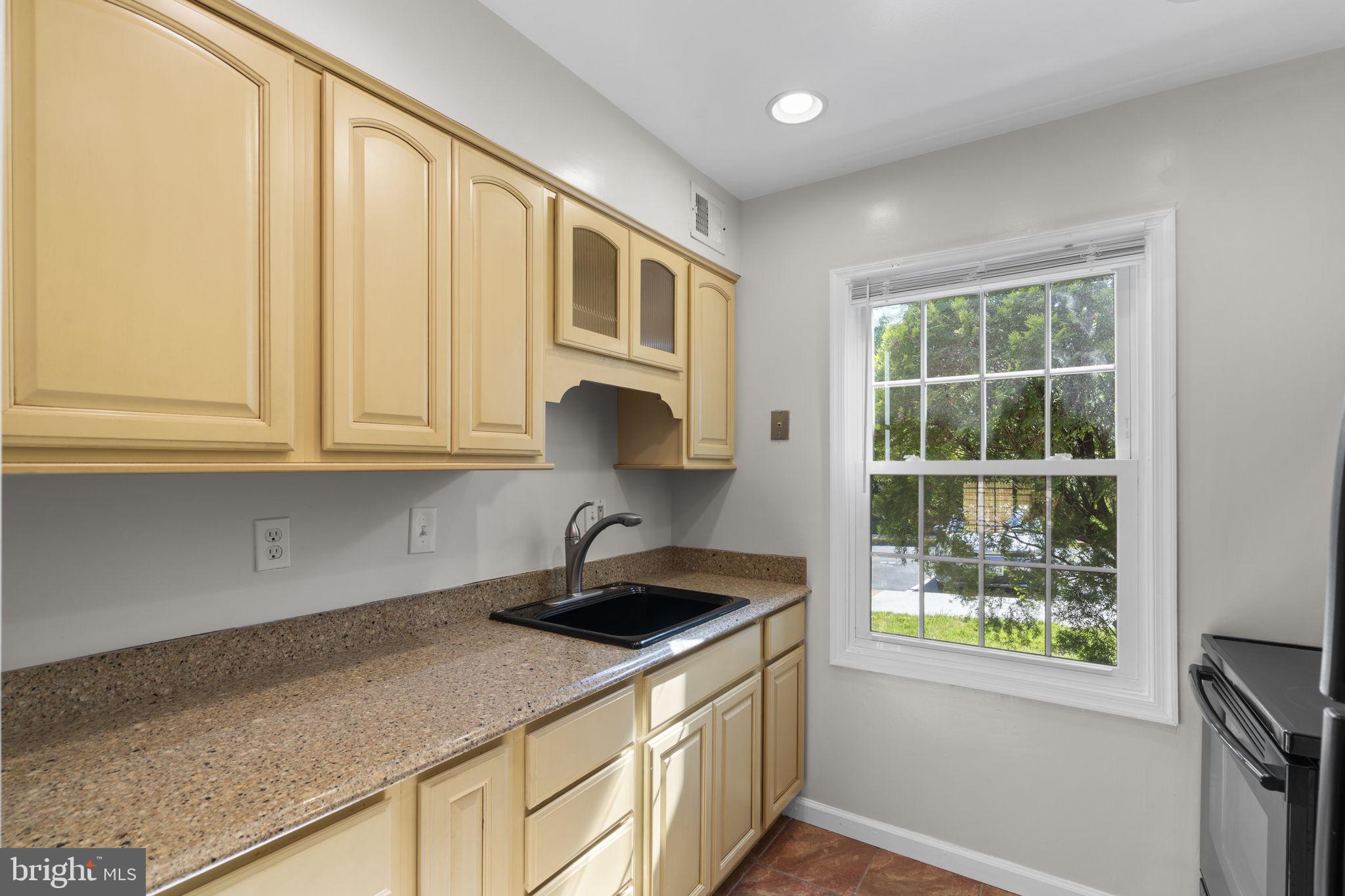 8221 Tory Road, Unit 150 Springfield, VA 22152 - Photo 15 of 36 Bright and inviting kitchen space.