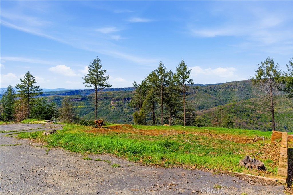 6473 Gregory Lane Paradise, CA 95969 - Photo 12 of 14 a view of a fountain in front of a house with a big yard