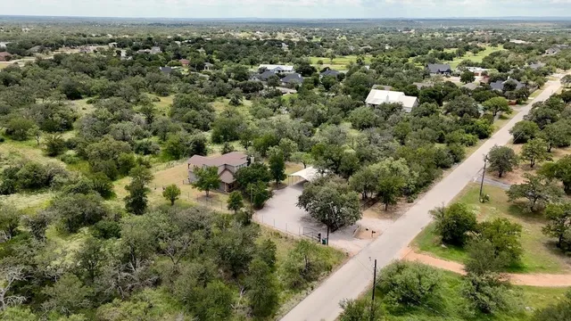 an aerial view of a city with lots of residential buildings
