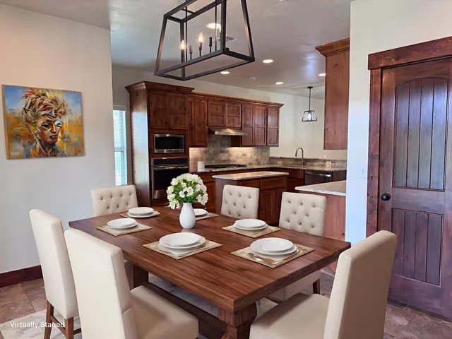 a view of a dining room with furniture