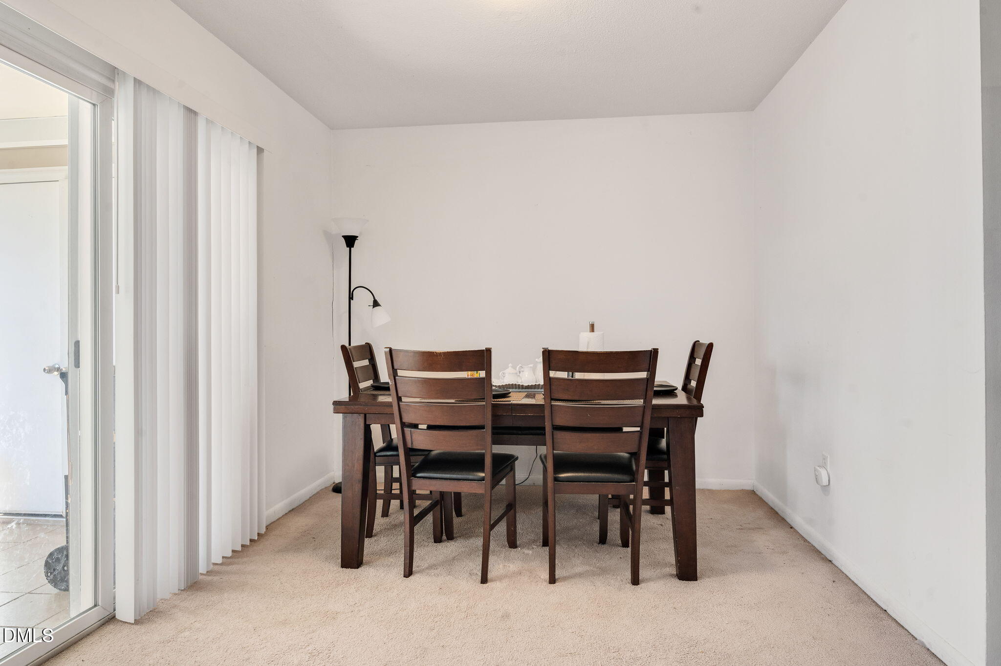 4603 Edwards Mill Road Raleigh, NC 27612 - Photo 7 of 26 a view of a dining room with furniture