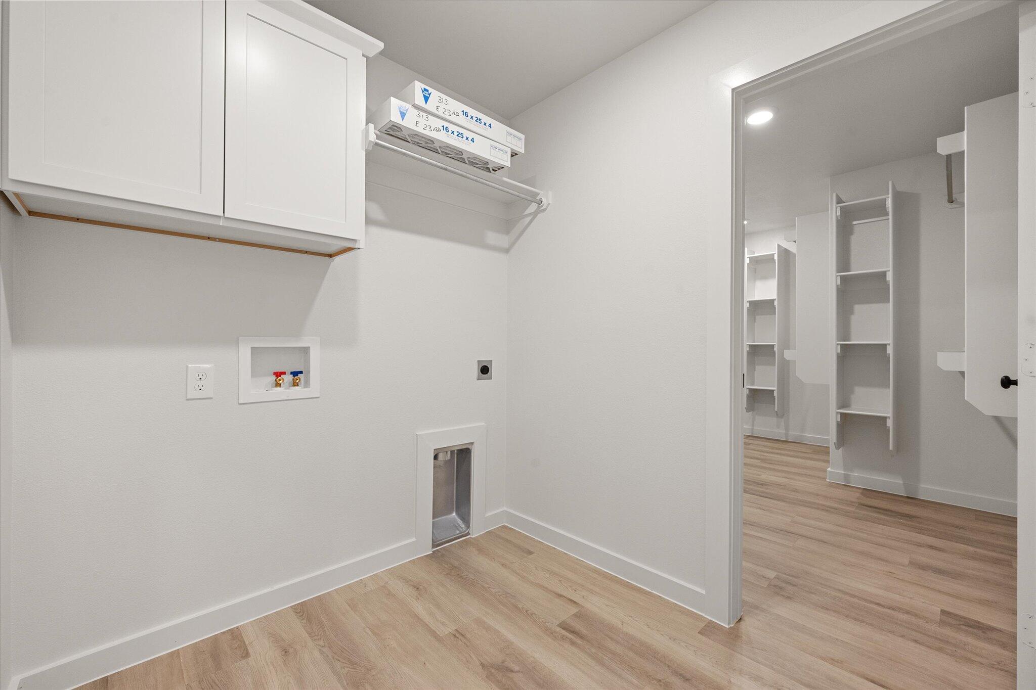 313 East 23rd Street Wolfforth, TX 79382 - Photo 21 of 22 a view of empty room with wooden floor