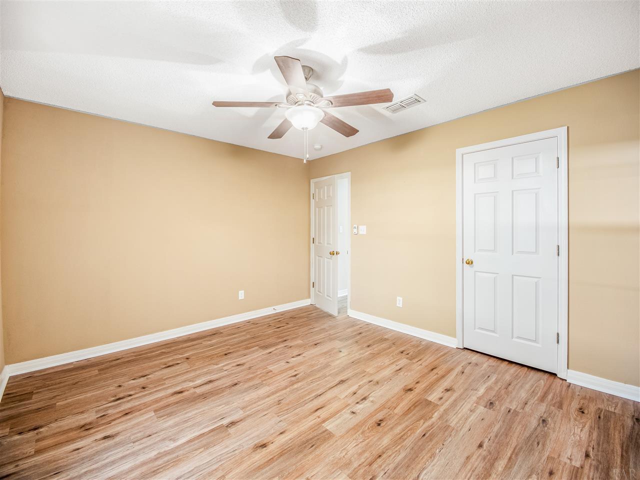 5934 Ridgeview Drive Milton, FL 32570 - Photo 26 of 43 New Vinyl Plank Flooring