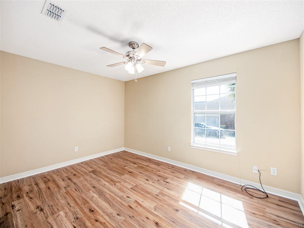 5934 Ridgeview Drive Milton, FL 32570 - Photo 29 of 43 New Vinyl Plank Flooring