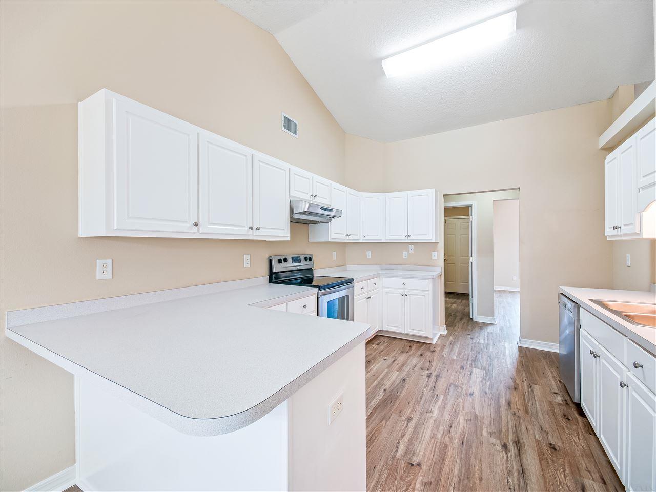 5934 Ridgeview Drive Milton, FL 32570 - Photo 9 of 43 New Vinyl Plank Flooring