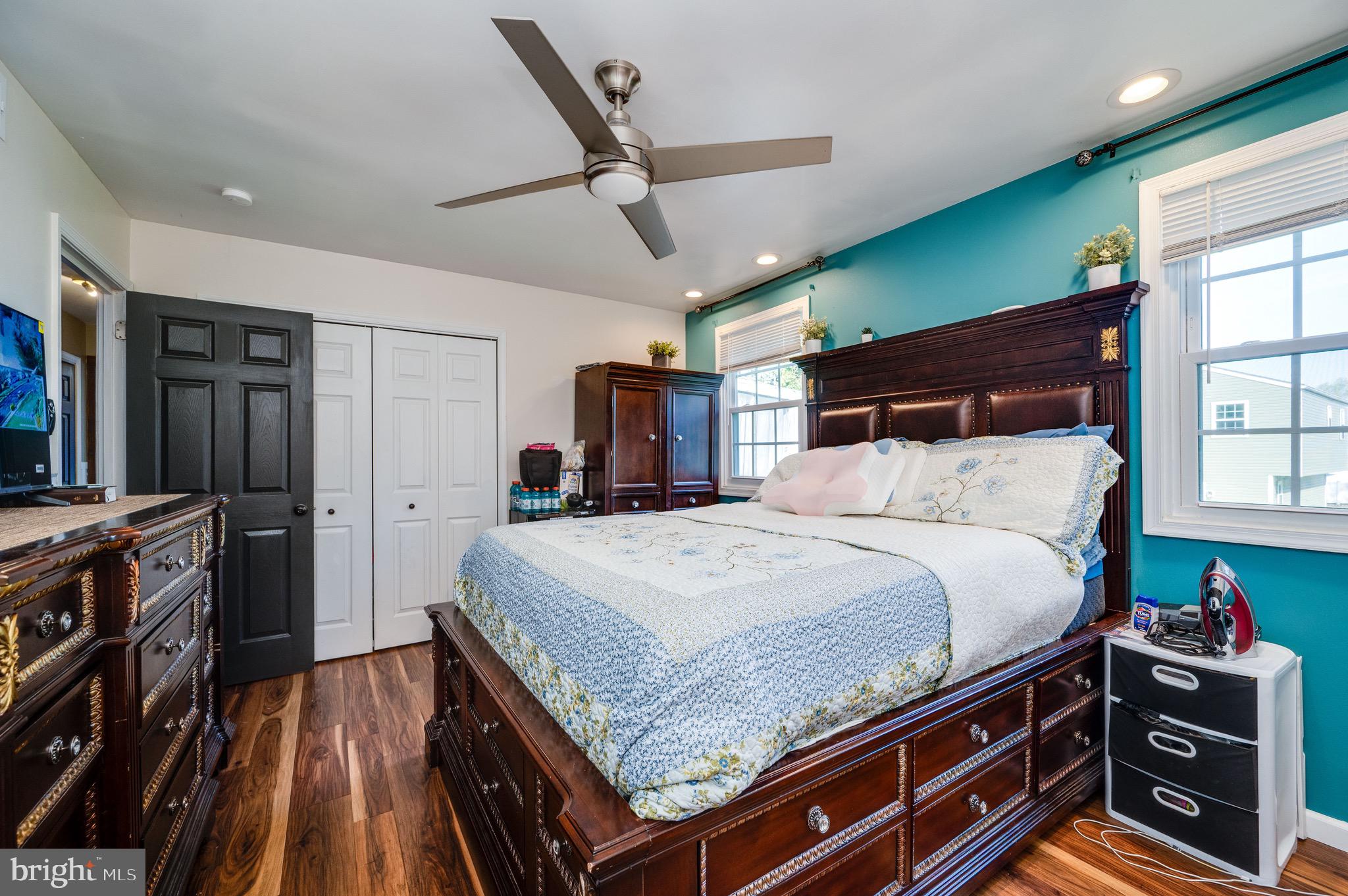 1005 Landover Drive Reading, PA 19605 - Photo 35 of 46 a bedroom with a bed and wooden floor