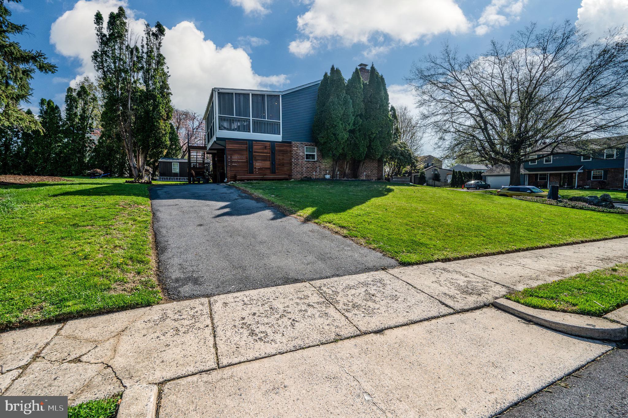 1005 Landover Drive Reading, PA 19605 - Photo 6 of 46 a front view of a house with garden