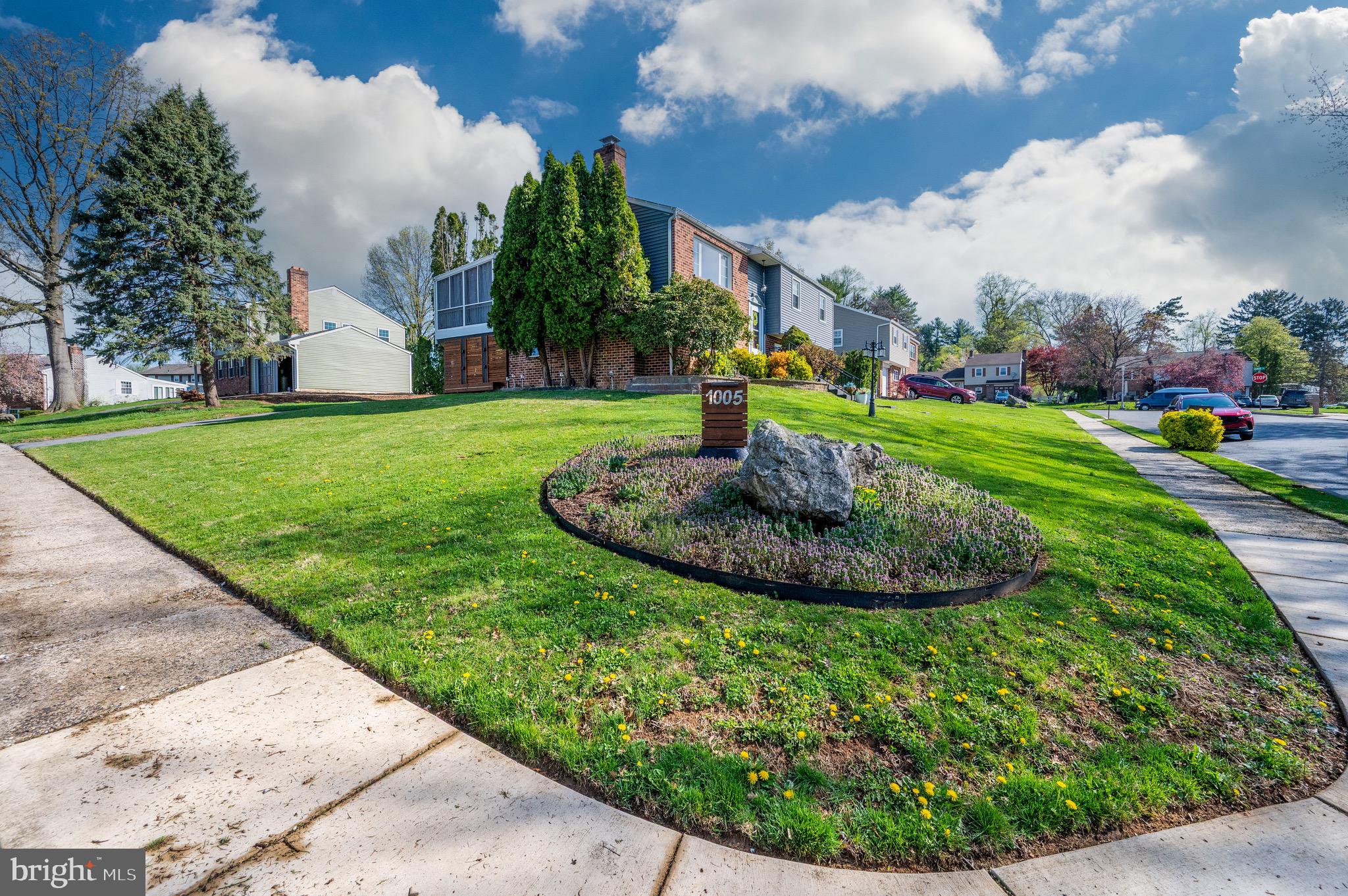 1005 Landover Drive Reading, PA 19605 - Photo 7 of 46 a view of a garden with a fountain