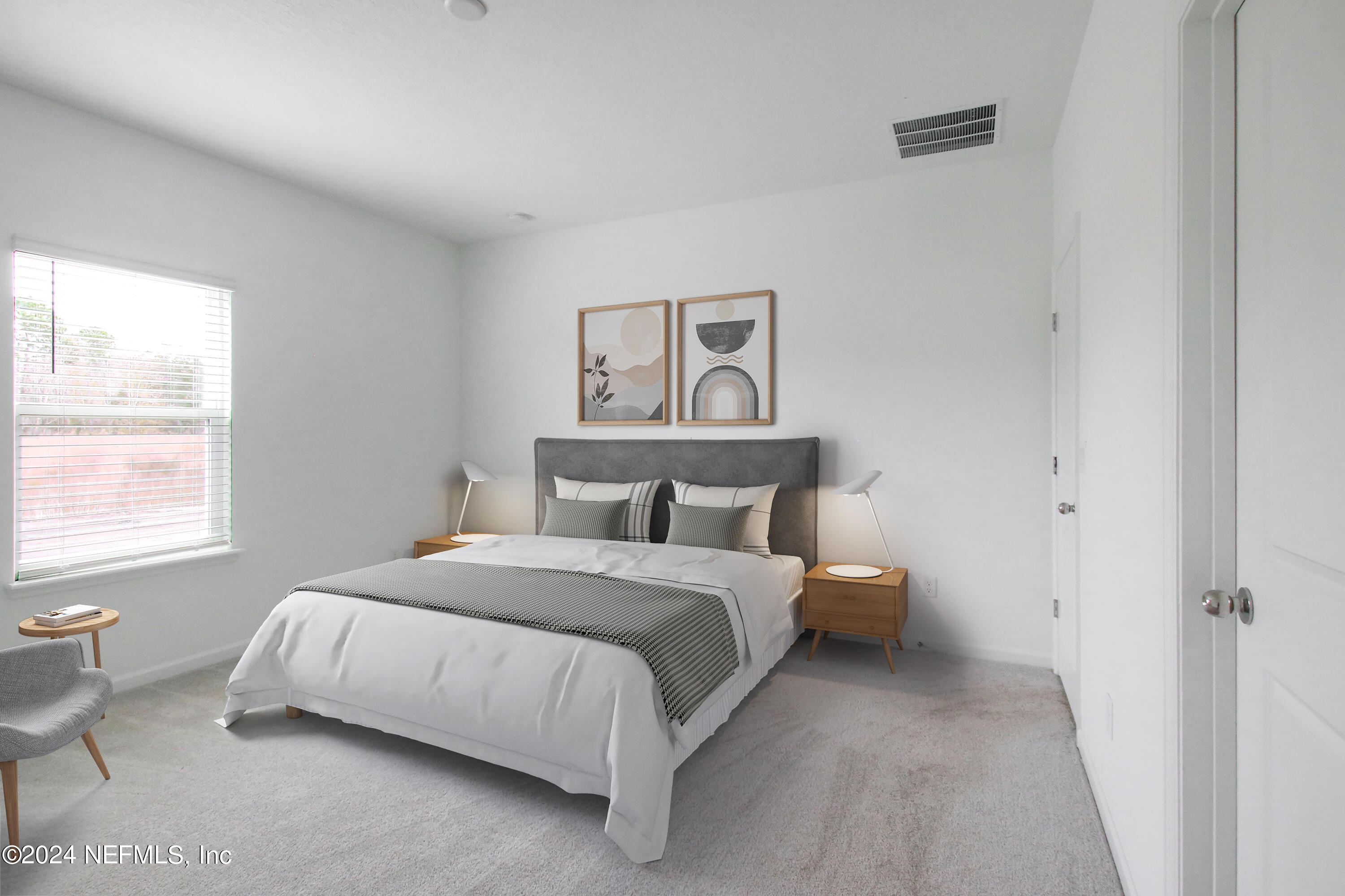 273 Pentwater Road St. Augustine, FL 32092 - Photo 10 of 13 a bedroom with a bed and a window