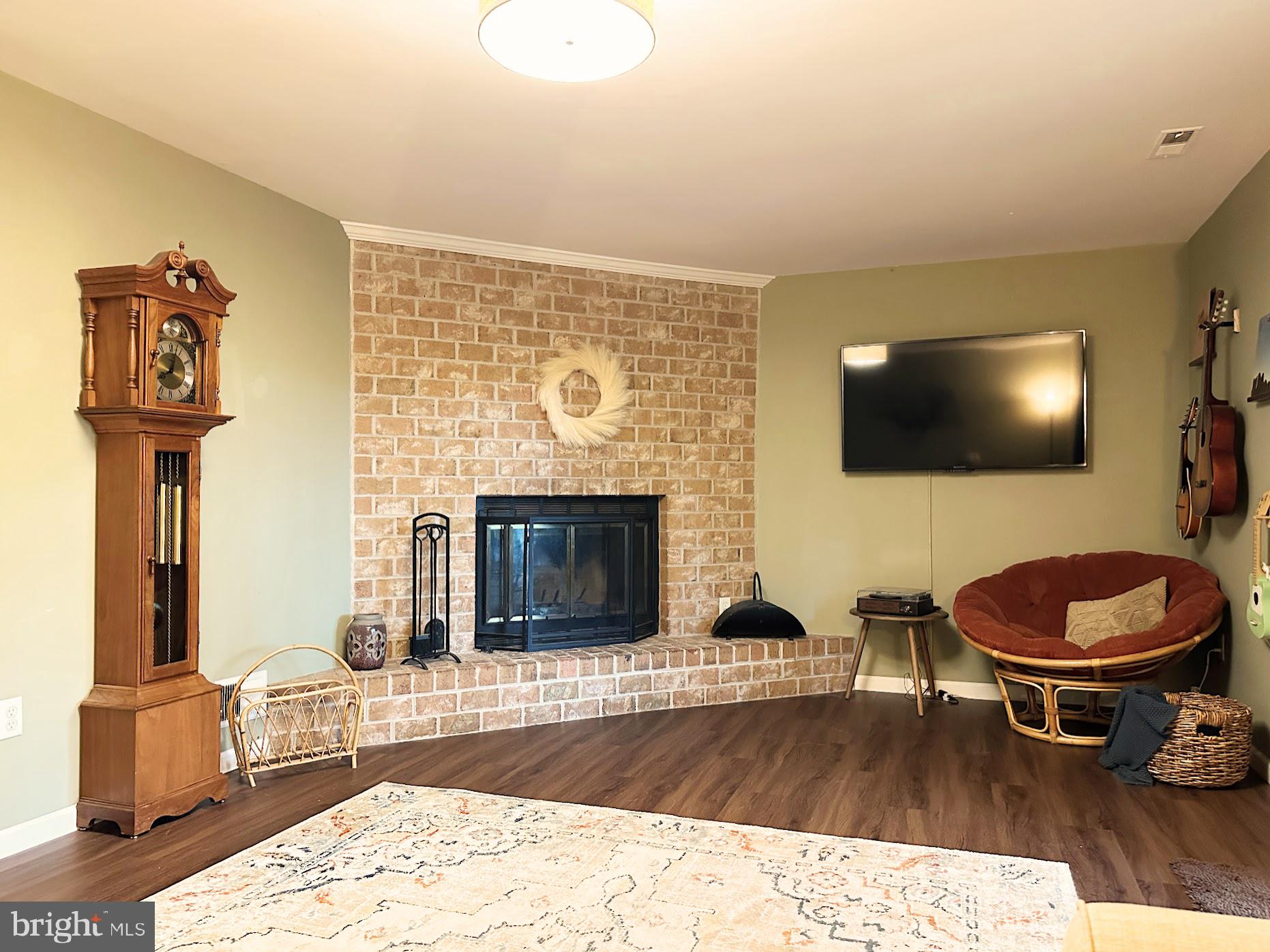 9767 Early Spring Way Columbia, MD 21046 - Photo 34 of 50 Rec Room with Brick FP