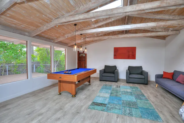 a room with furniture and a rug