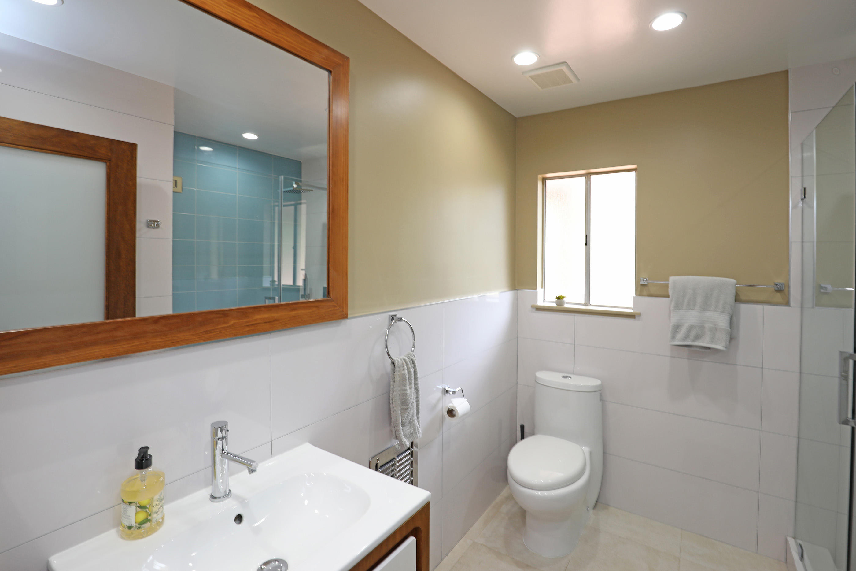 824 Alston Road Santa Barbara, CA 93108 - Photo 19 of 25 a bathroom with a sink a toilet and mirror