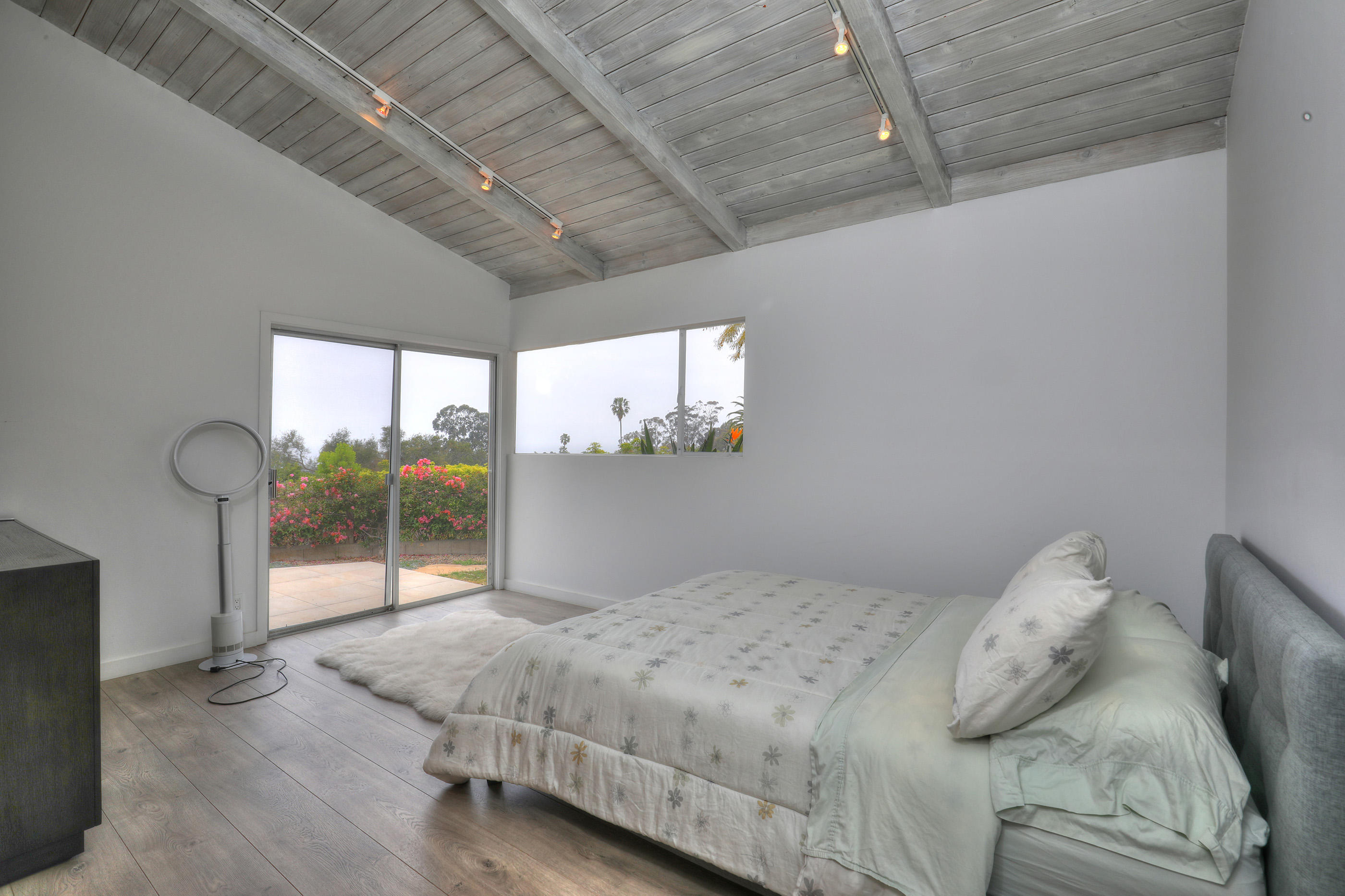 824 Alston Road Santa Barbara, CA 93108 - Photo 20 of 25 a bedroom with a bed and a painting on the wall