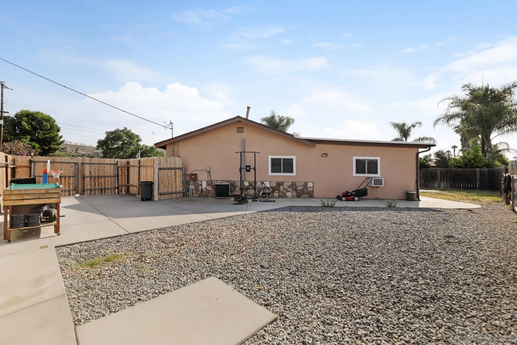 13134 Acton Avenue Poway, CA 92064 - Photo 35 of 37 a view of a house with backyard and sitting area