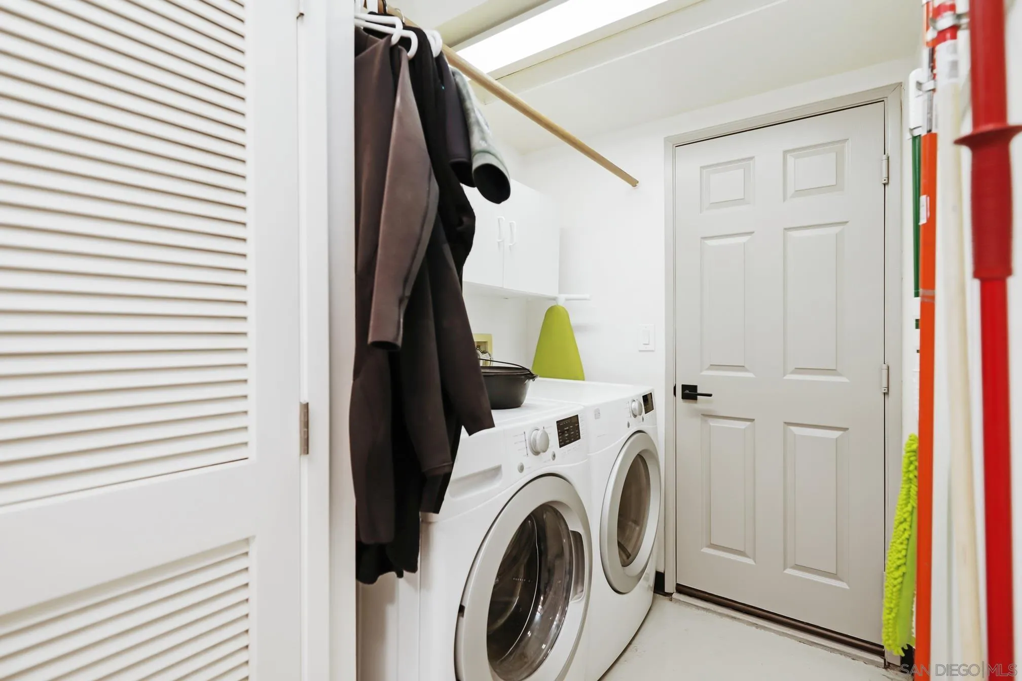 13134 Acton Avenue Poway, CA 92064 - Photo 37 of 37 a utility room with dryer and washer