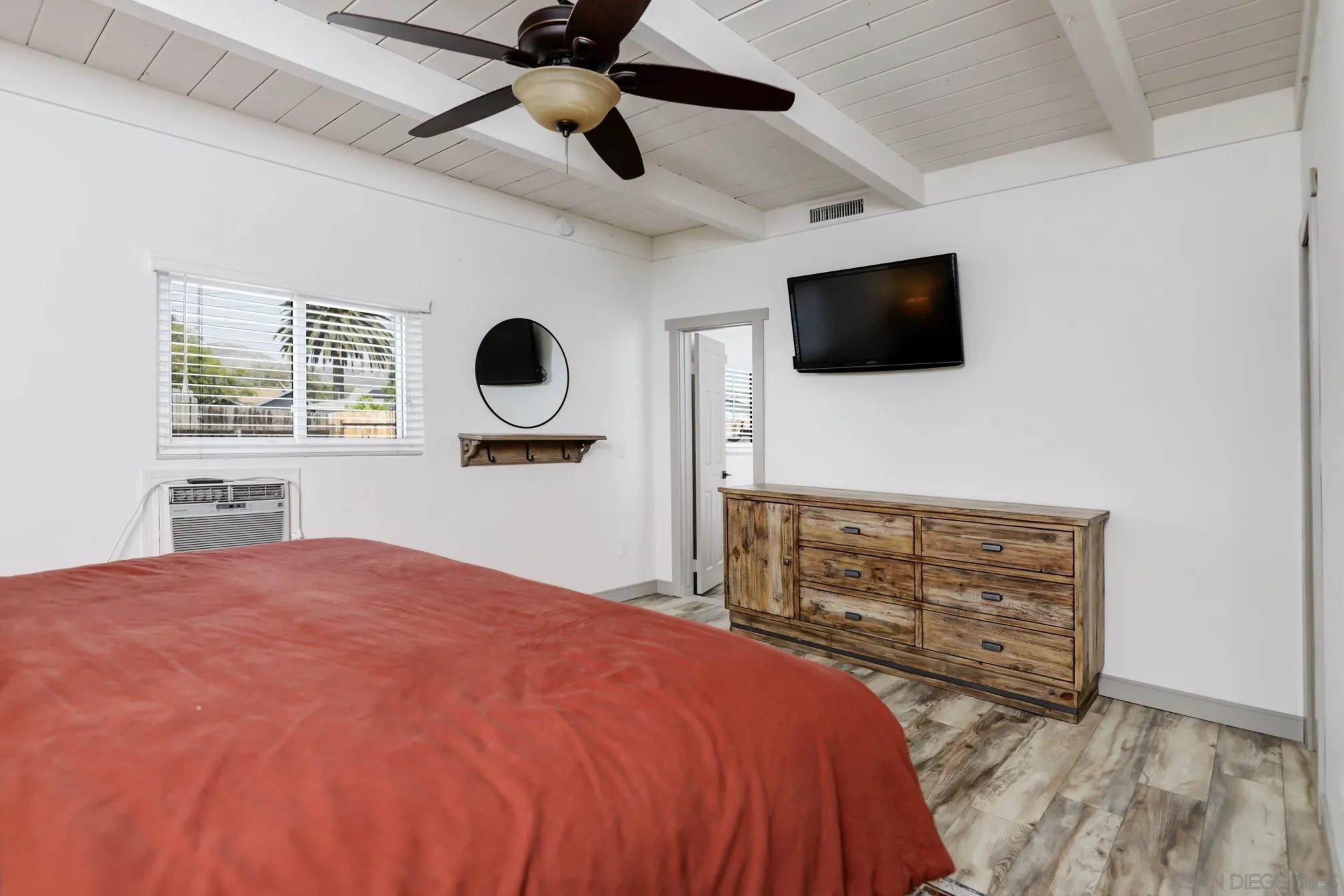 13134 Acton Avenue Poway, CA 92064 - Photo 8 of 37 a bedroom with a bed a flat screen tv and dresser