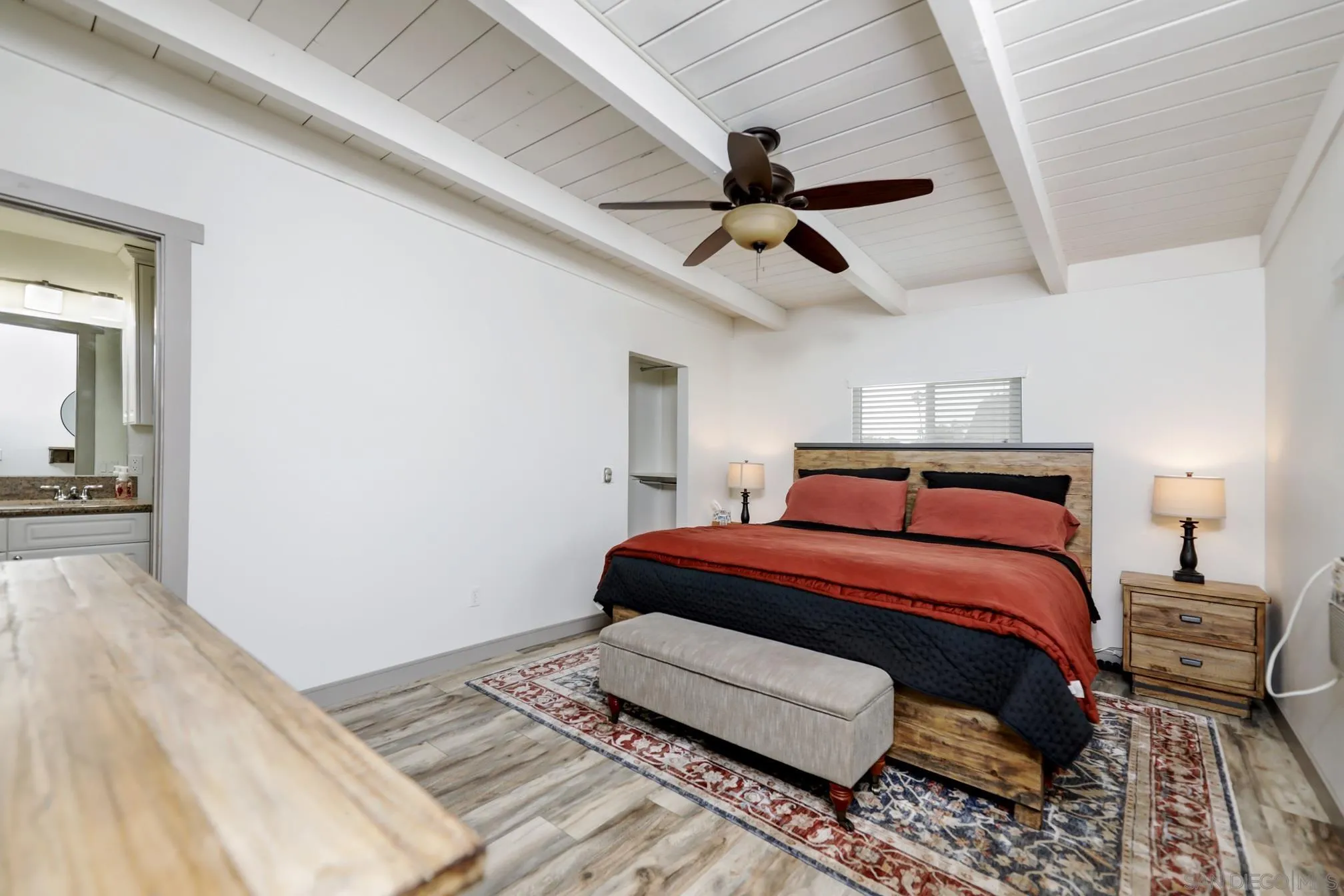 13134 Acton Avenue Poway, CA 92064 - Photo 9 of 37 a bed room with a bed and a chandelier