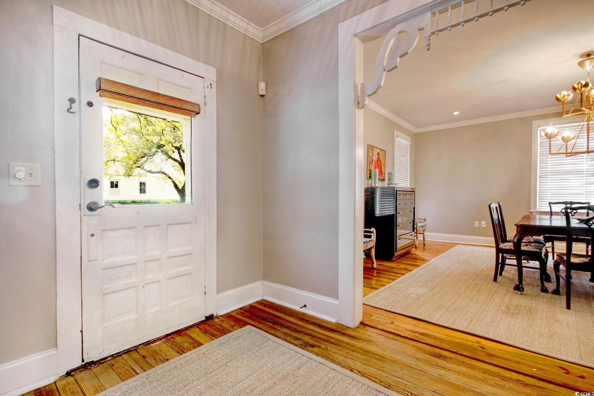 307 Queen Street Georgetown, SC 29440 - Photo 7 of 38 Foyer featuring hardwood / wood-style floors, orna