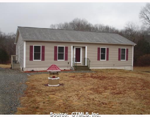 24 Potash Hill Road Sprague, CT 06330 - Photo 1 of 1 a view of a house with backyard and porch