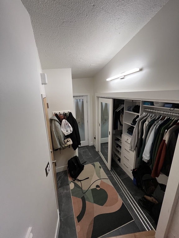 12 Stoneholm Street, Unit 322 Boston, MA 02115 - Photo 17 of 33 a view of a room with chairs