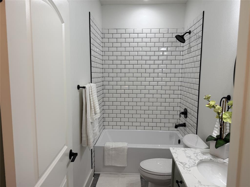 123 Church Street Belcher, LA 71004 - Photo 13 of 30 a bathroom with a toilet and shower