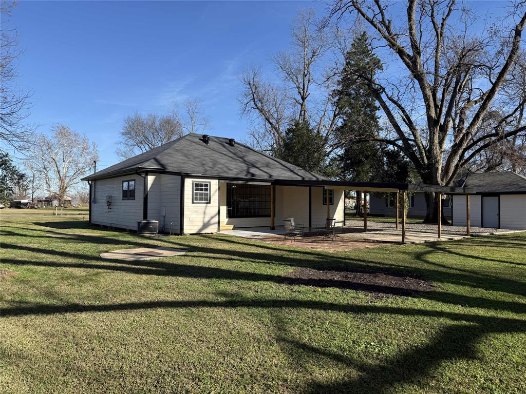 123 Church Street Belcher, LA 71004 - Photo 29 of 30 a front view of a house with a yard