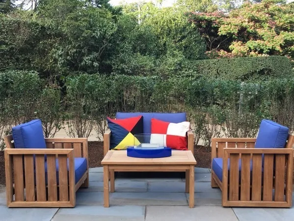 a living room with fireplace furniture and a fireplace