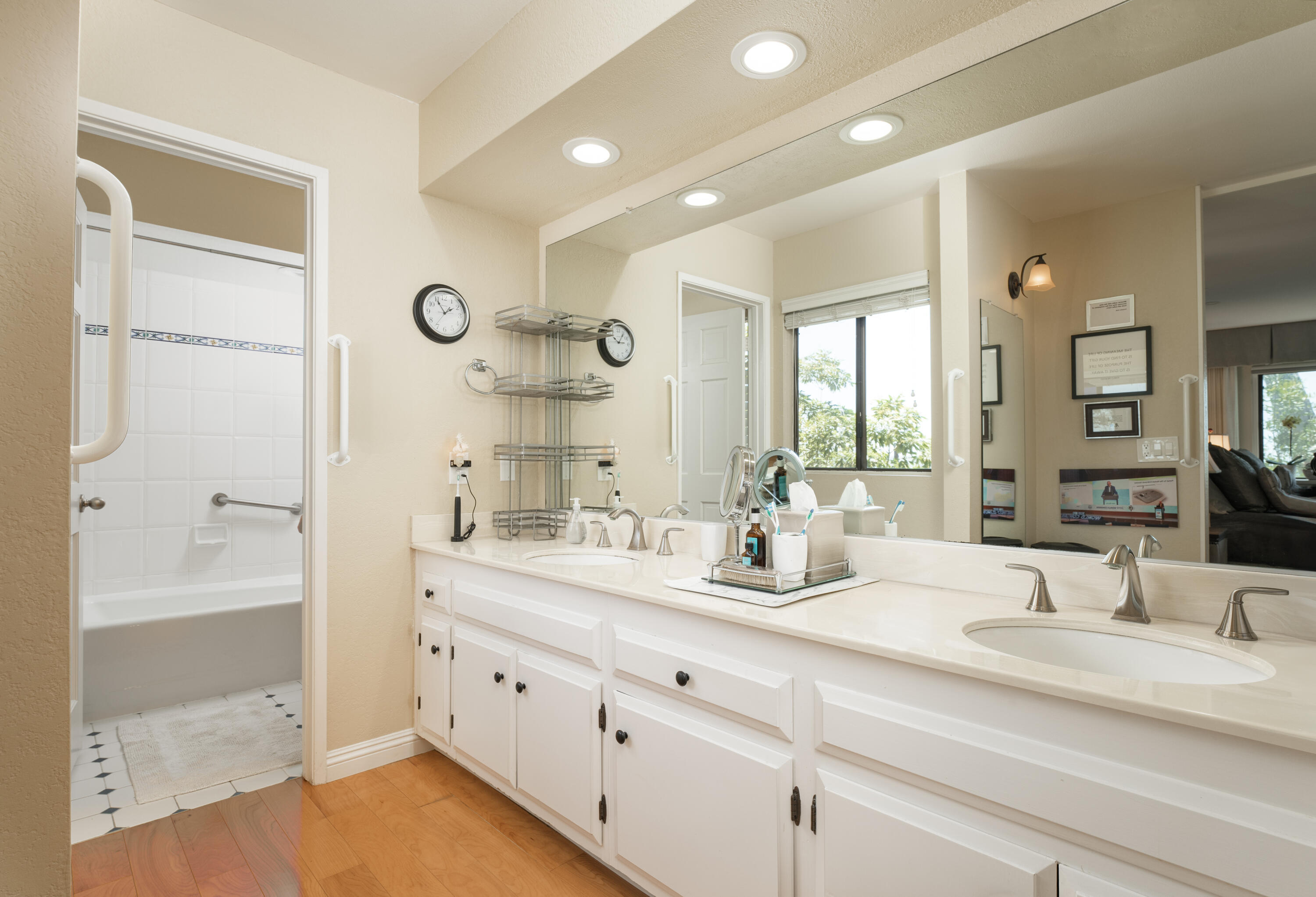 823 Via Granada Santa Barbara, CA 93103 - Photo 12 of 22 a bathroom with double vanity and a mirror