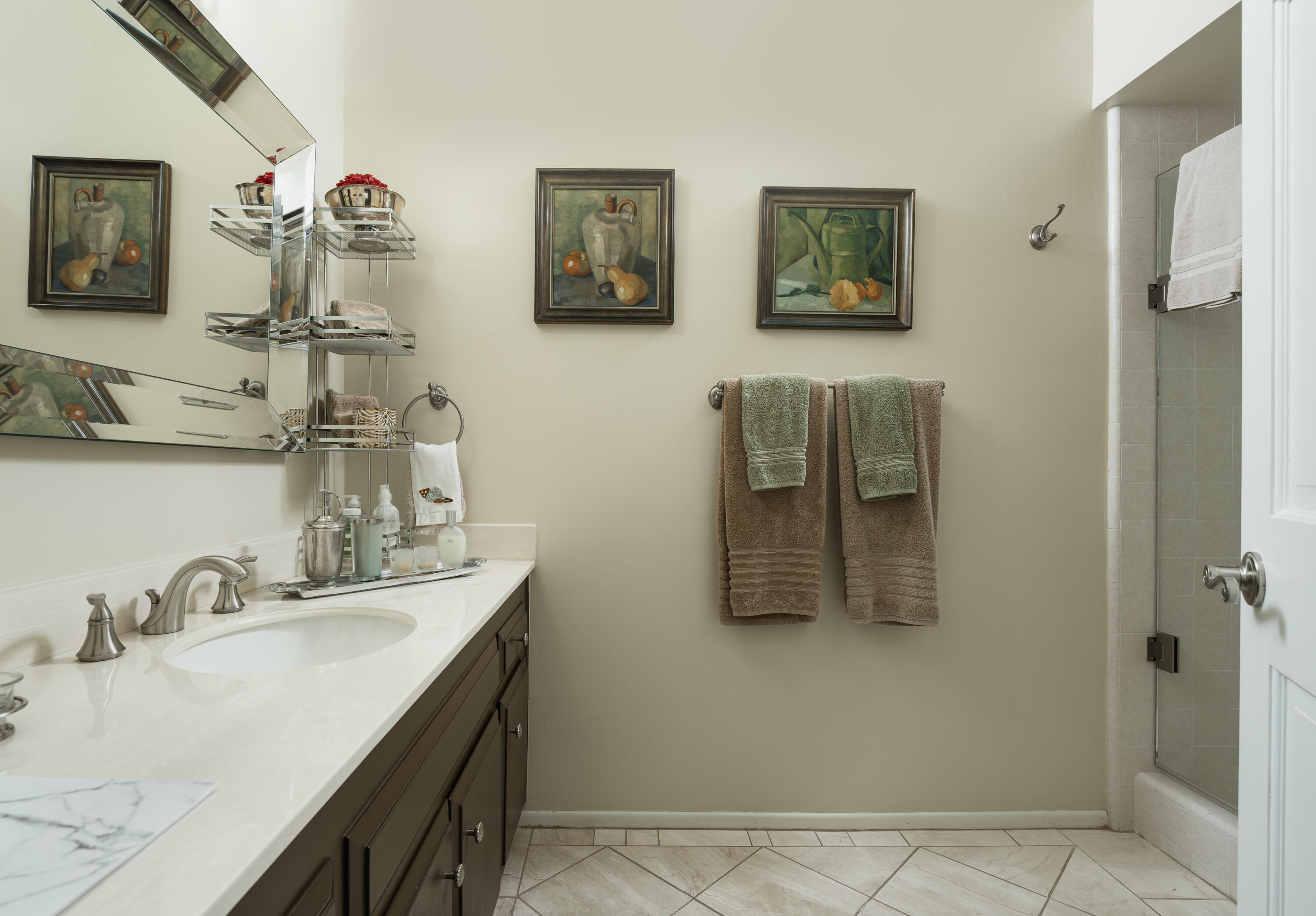 823 Via Granada Santa Barbara, CA 93103 - Photo 16 of 22 a bathroom with a sink and mirror