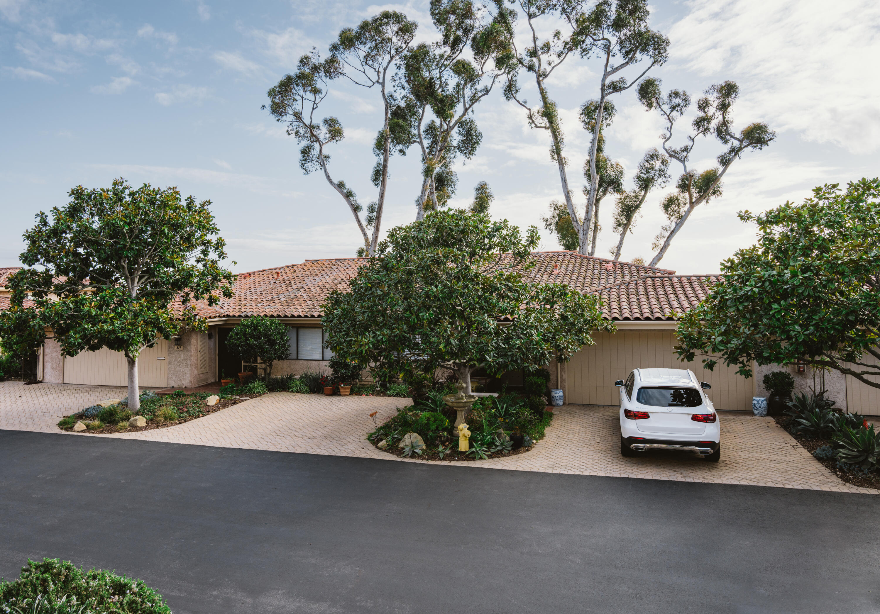 823 Via Granada Santa Barbara, CA 93103 - Photo 2 of 22 a car parked on the side of the road