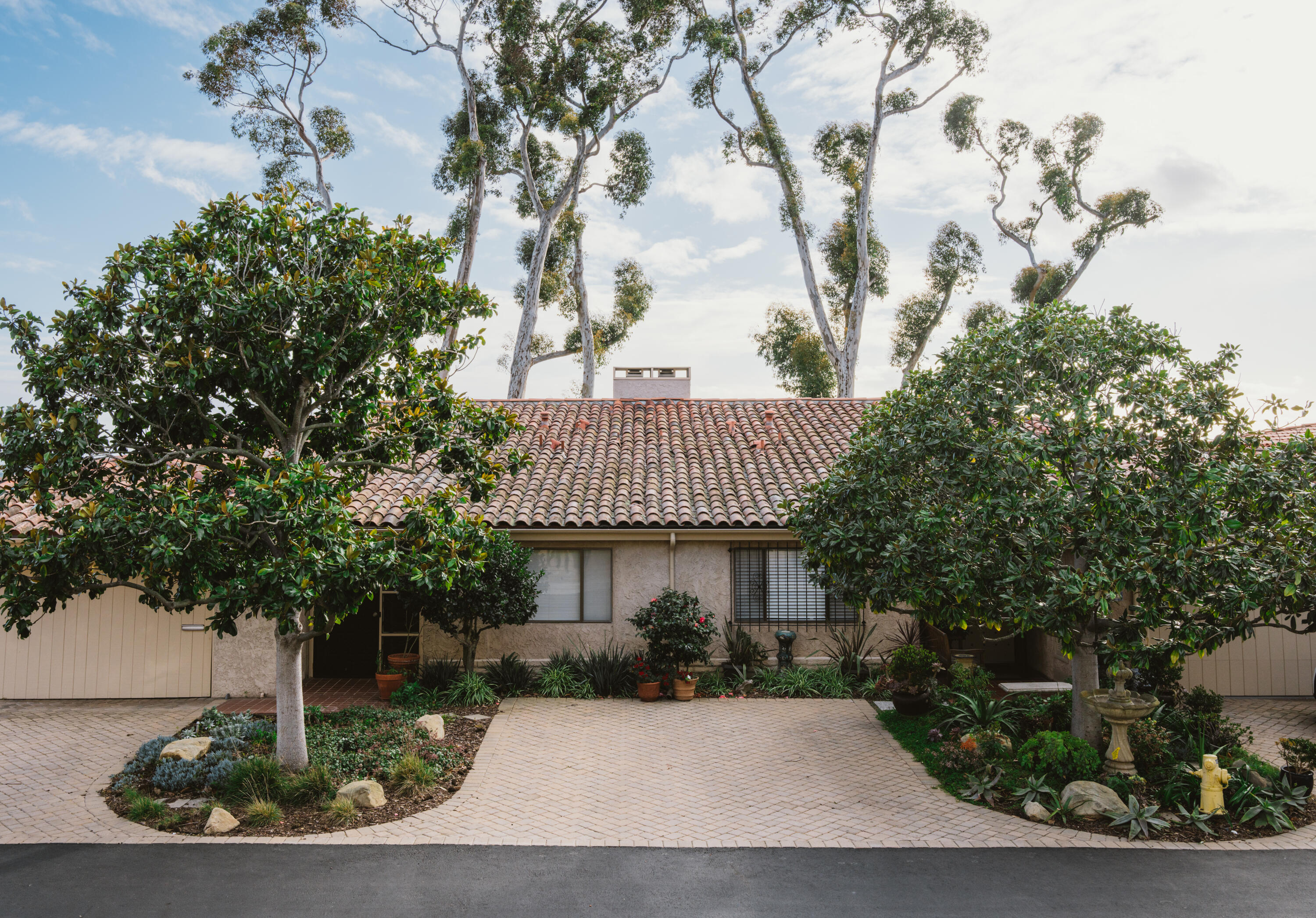 823 Via Granada Santa Barbara, CA 93103 - Photo 21 of 22 a front view of a house with a garden