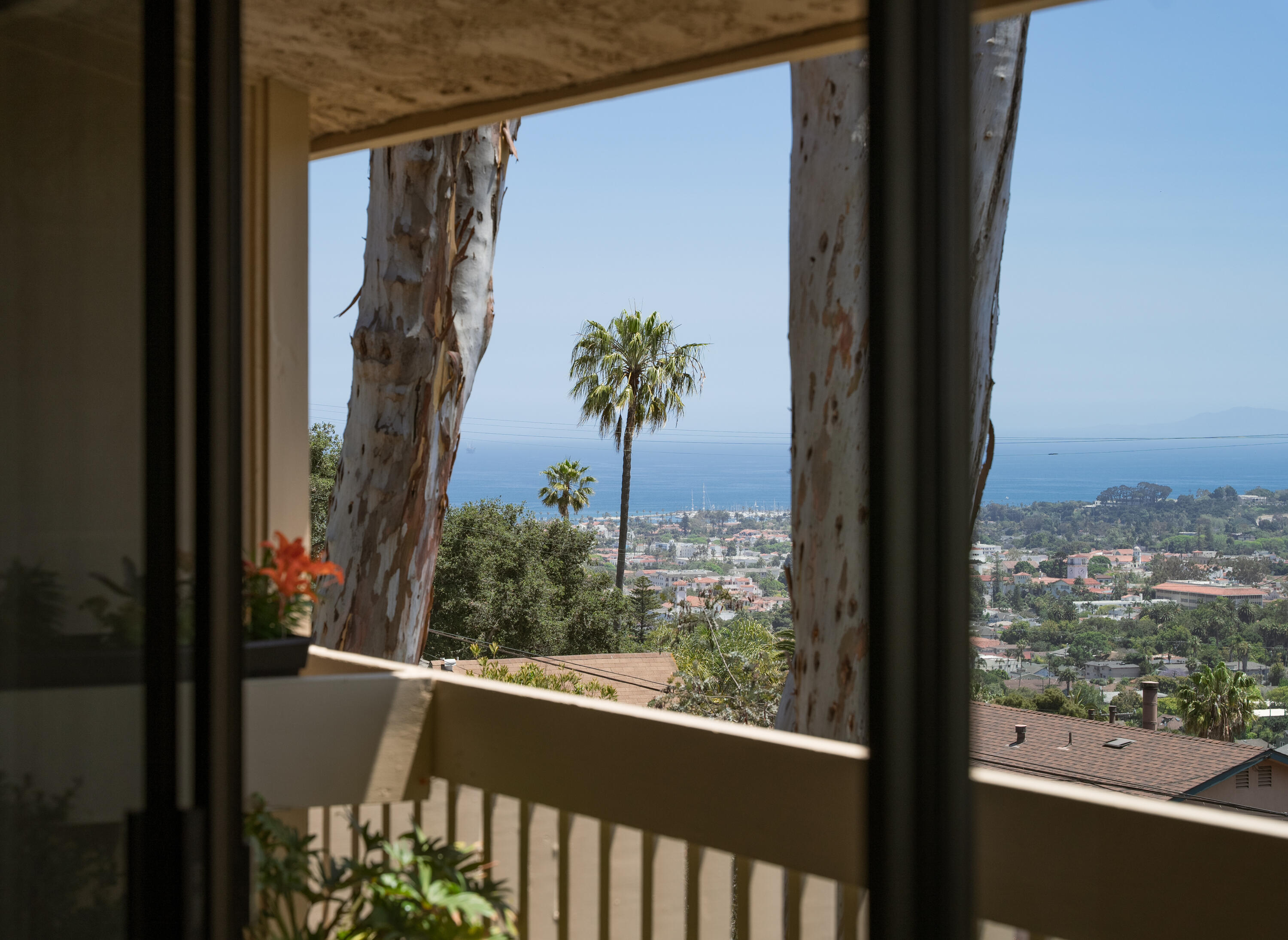 823 Via Granada Santa Barbara, CA 93103 - Photo 4 of 22 a view of a glass door with a from a window