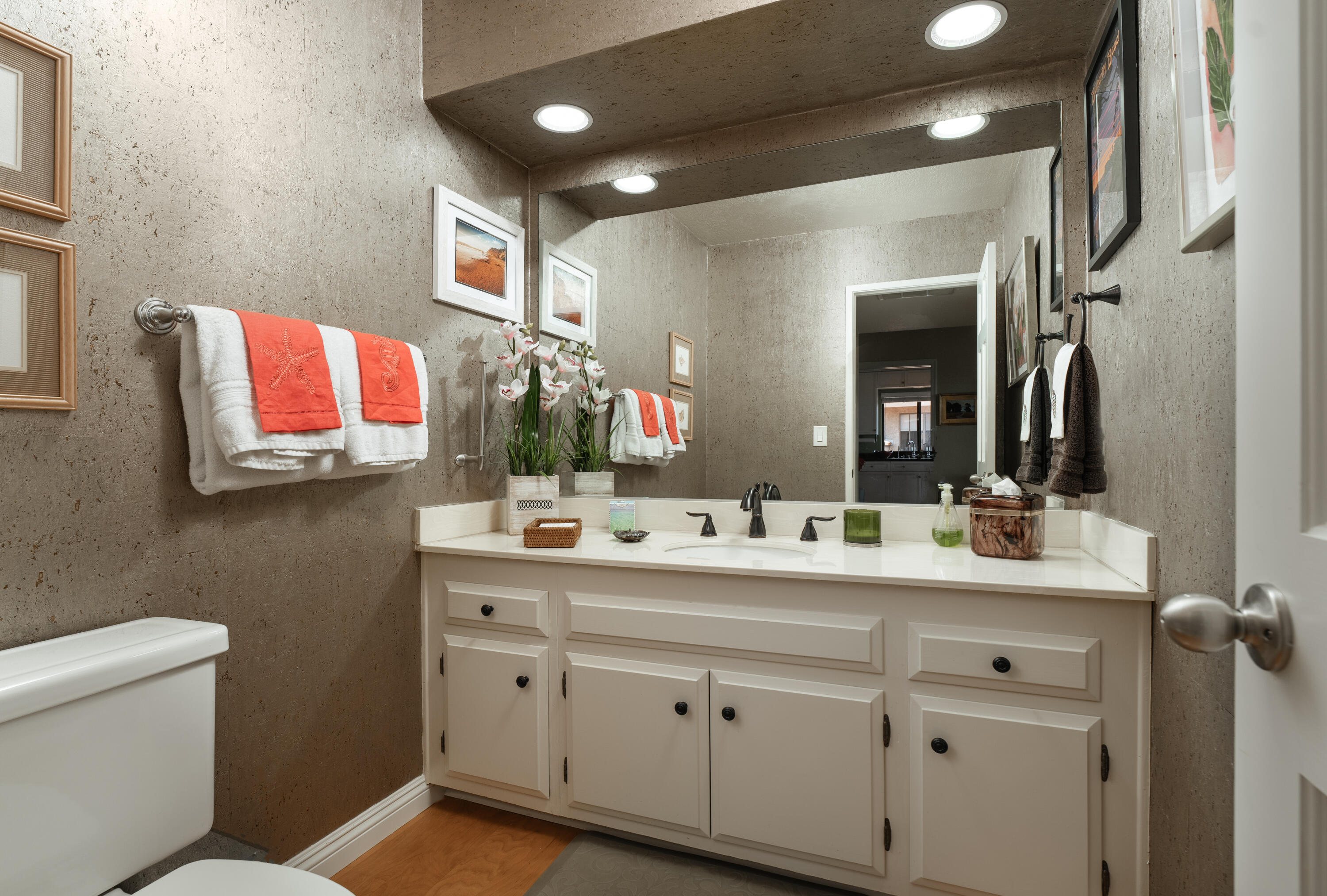 823 Via Granada Santa Barbara, CA 93103 - Photo 7 of 22 a bathroom with a double vanity sink mirror and toilet