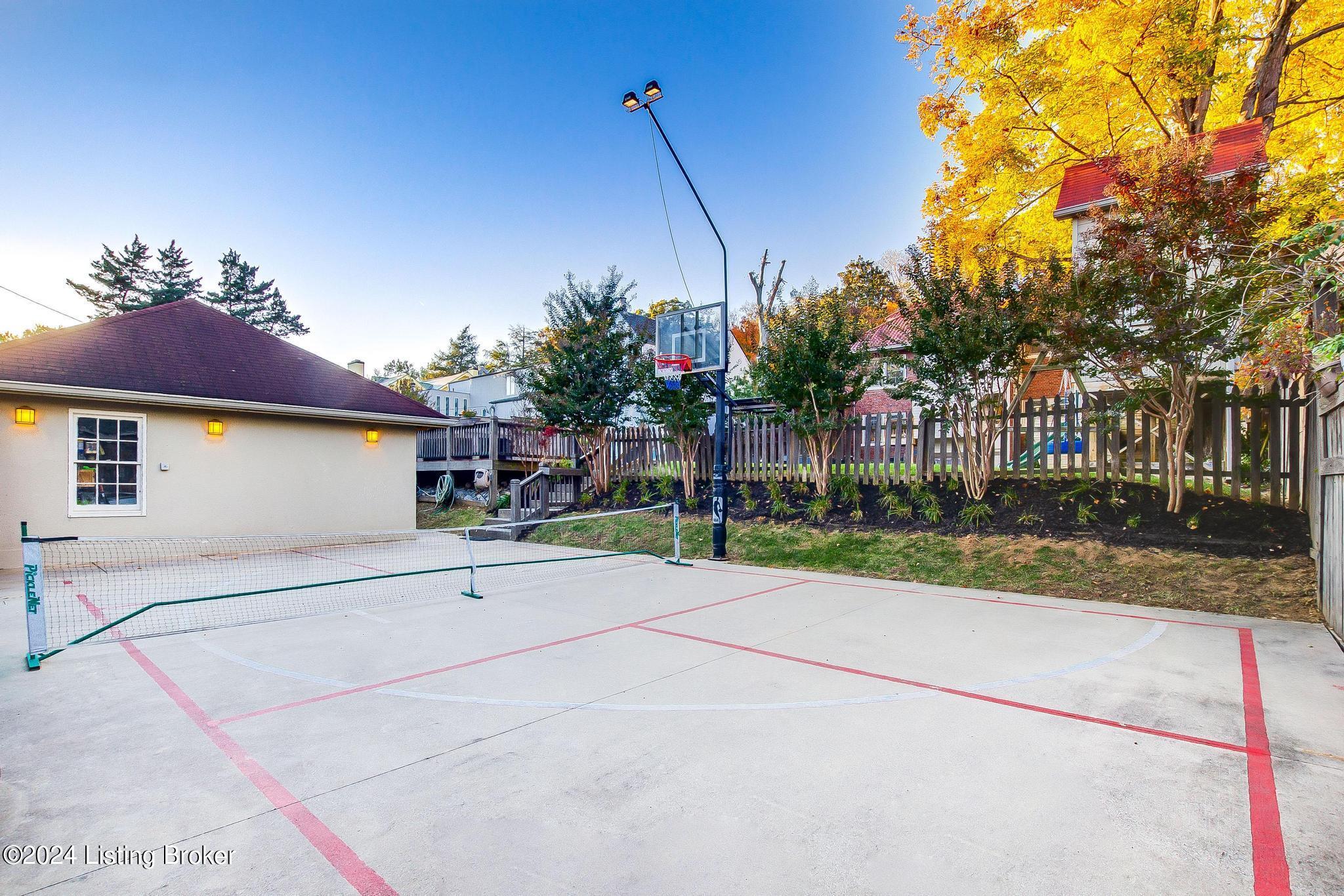 1450 Cherokee Road Louisville, KY 40204 - Photo 10 of 59 Whether you're enjoying a game on your own or hosting a lively gathering, this sports court is designed to offer fun and functionality for everyone.