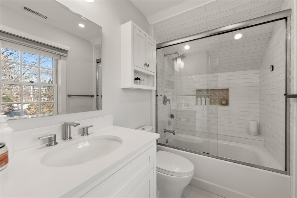 151 Oakland Street Wellesley, MA 02481 - Photo 21 of 42 a bathroom with a sink toilet and shower